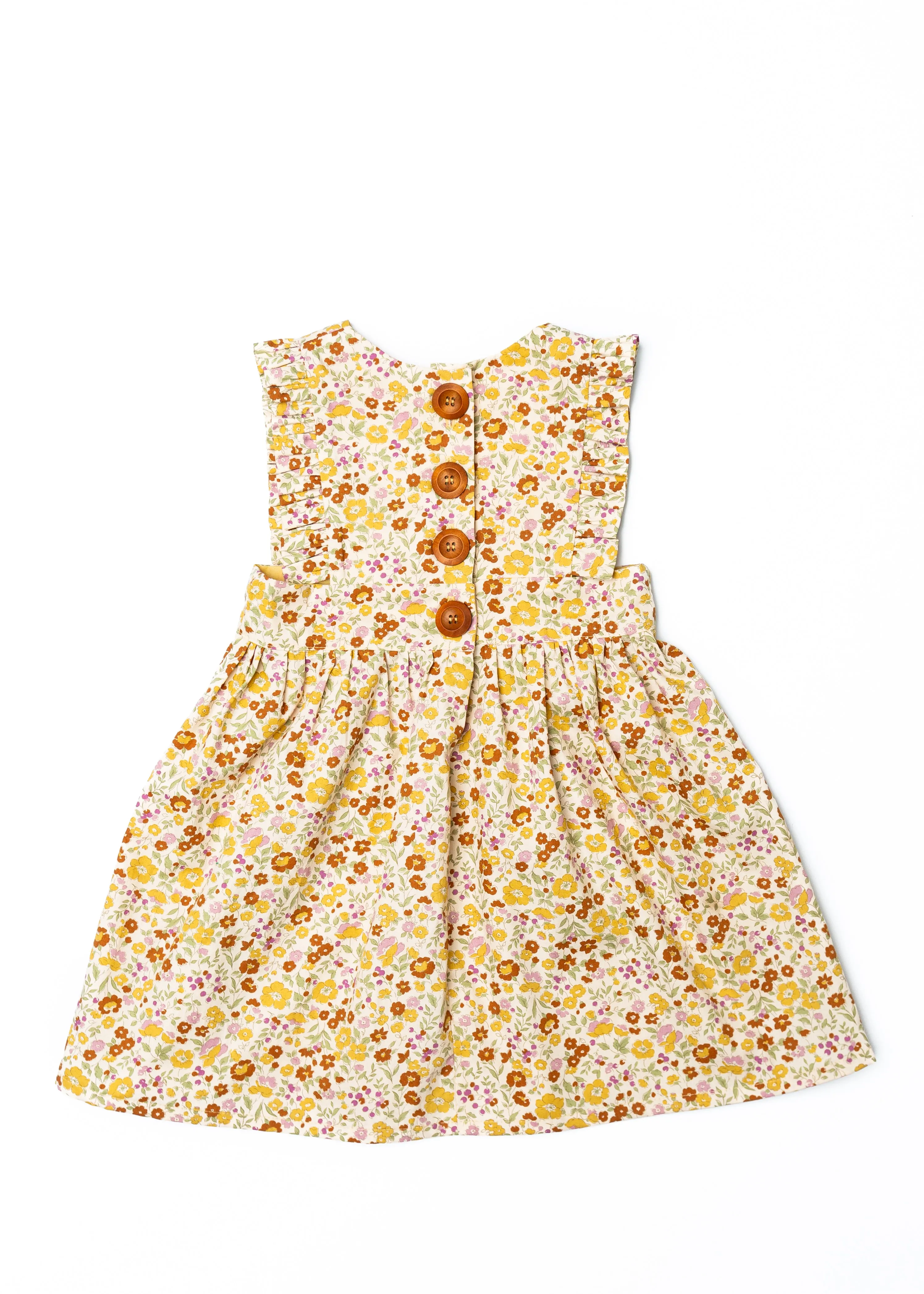 The Harper Pinafore in Mustard Floral